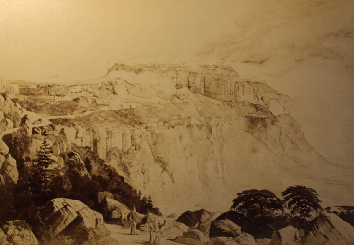 drawing of burning buildings on the top of a rocky plateau.