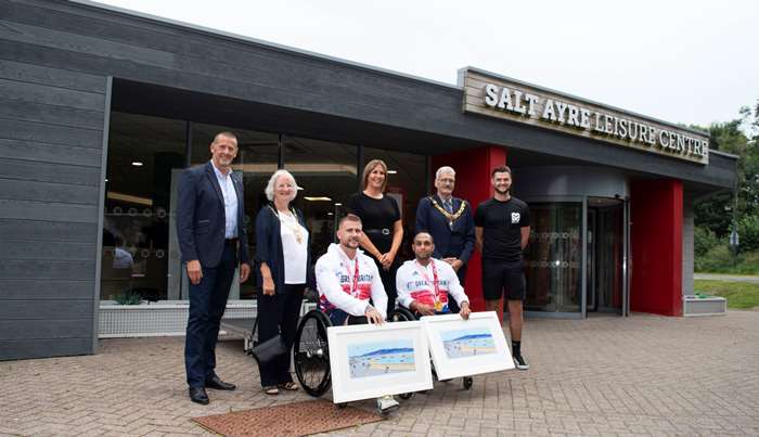 Stuart Robinson and Ayaz Bhuta being congratulated on their gold medals by Kevin Nicholls, Margaret Greenall (Mayoress of Lancaster), Rachel Williams (Salt Ayre manager), Councillor Mike Greenall (May