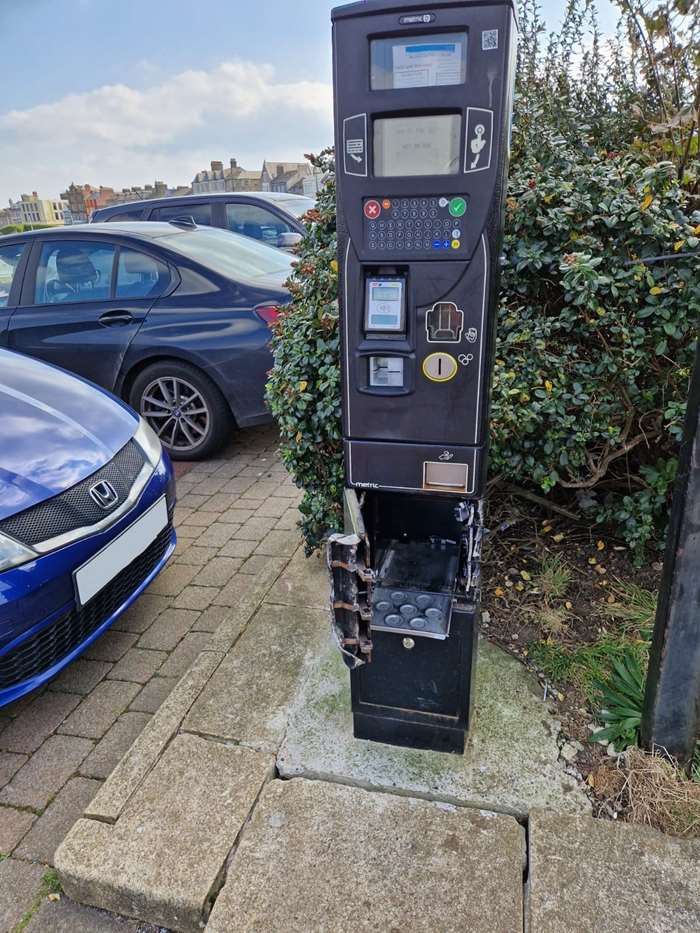 One of the damaged pay and display machines