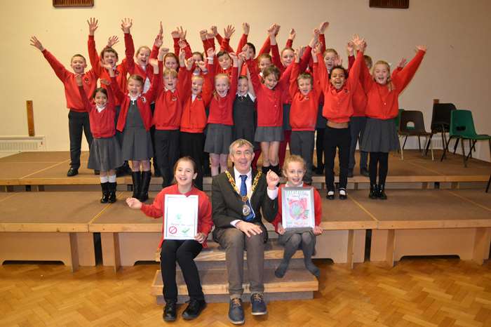 Jessica (10) and Carmella (8) receive their prizes fromh the Mayor of Lancaster, Coun Andrew Kay, and the school's Eco Committeee